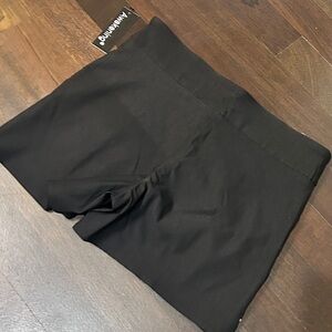 NWT. Awakening stretchy rayon black shorts. Size 12
